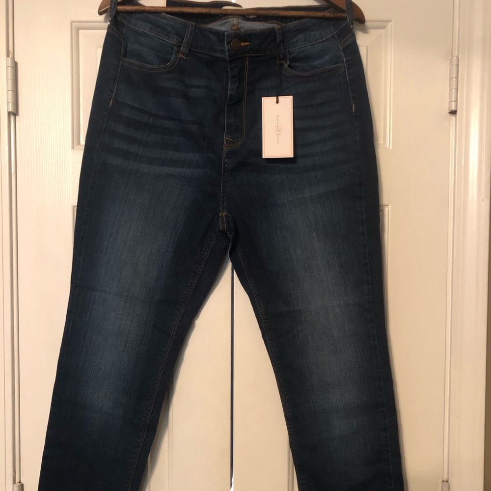 Dark blue mid rise skinny jeans
